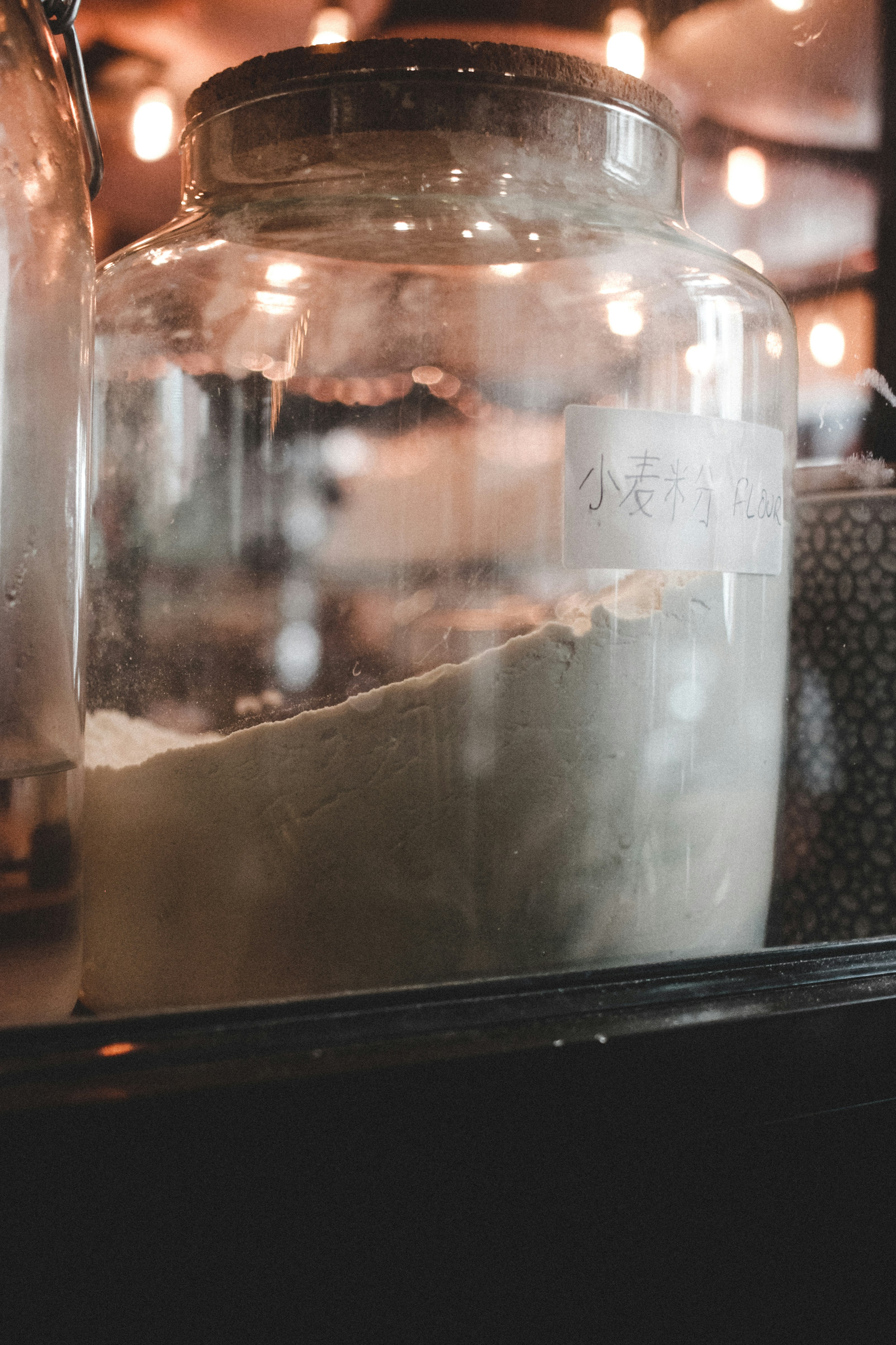 clear glass jar with white powder inside